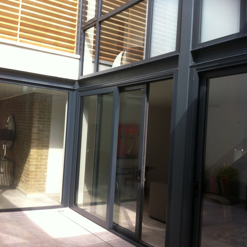 Anthracite aluminium sliding patio doors fitted in Teddington