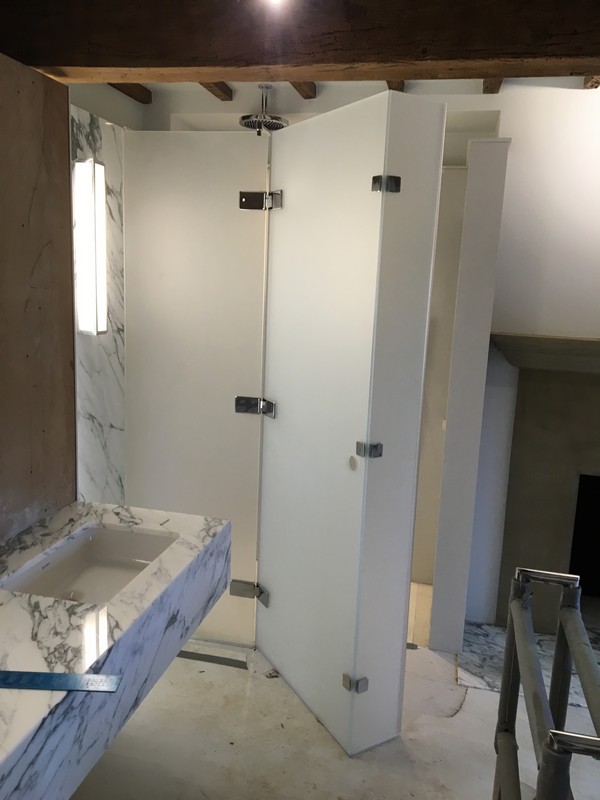 Bespoke frosted glass shower enclosure in Teddington luxury bathroom