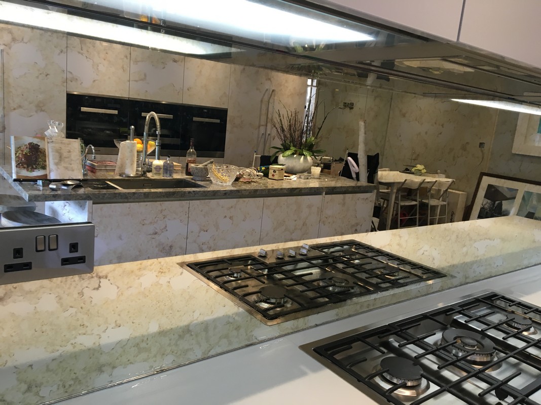 Mirror glass splashback in Teddington luxury kitchen